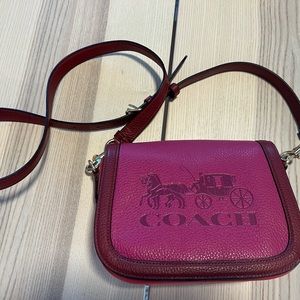 Coach leather purse with Horse & Carriage embossed logo